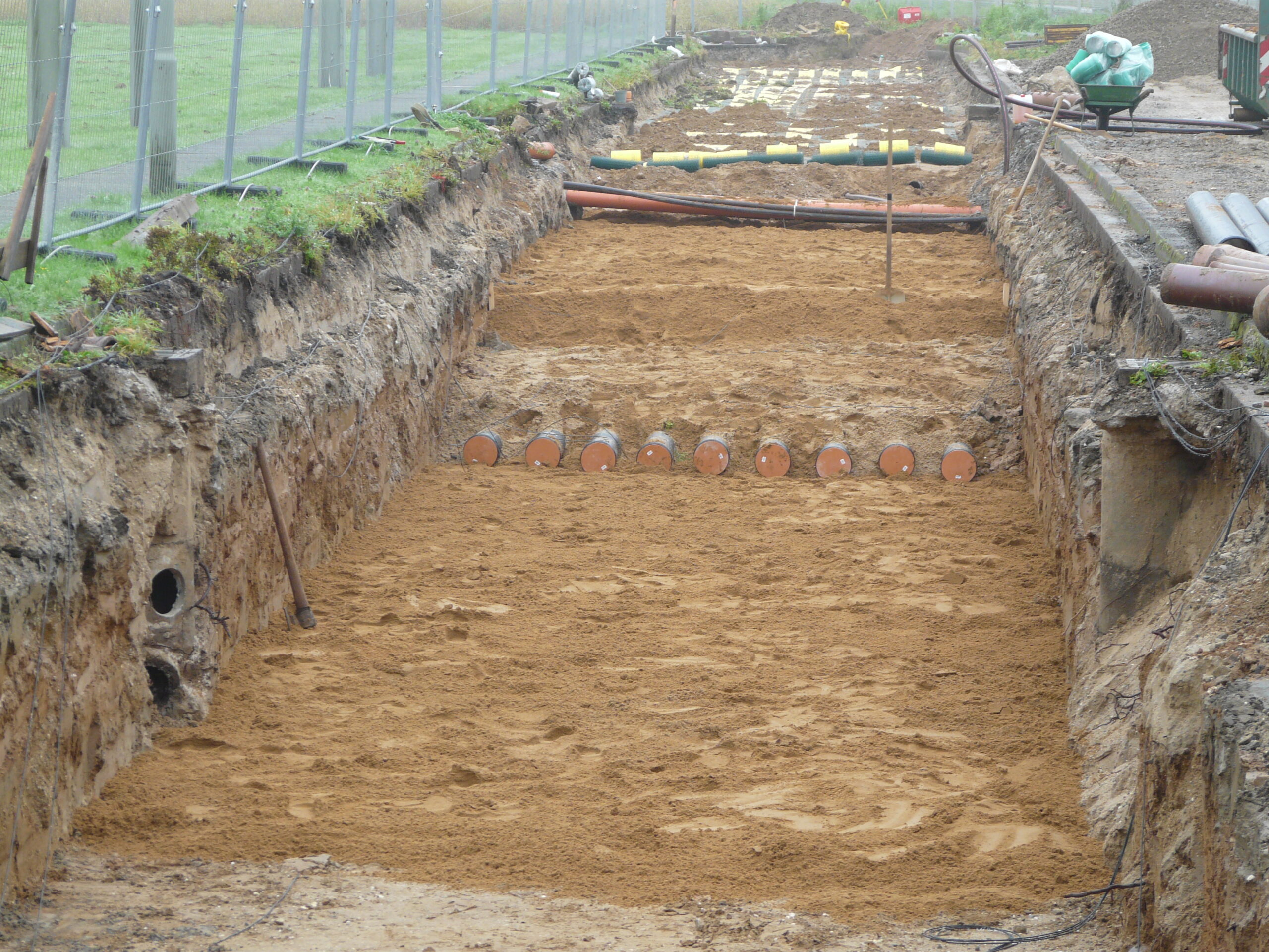 Einsanden erster Bettungsmaterialabschnitt Sand