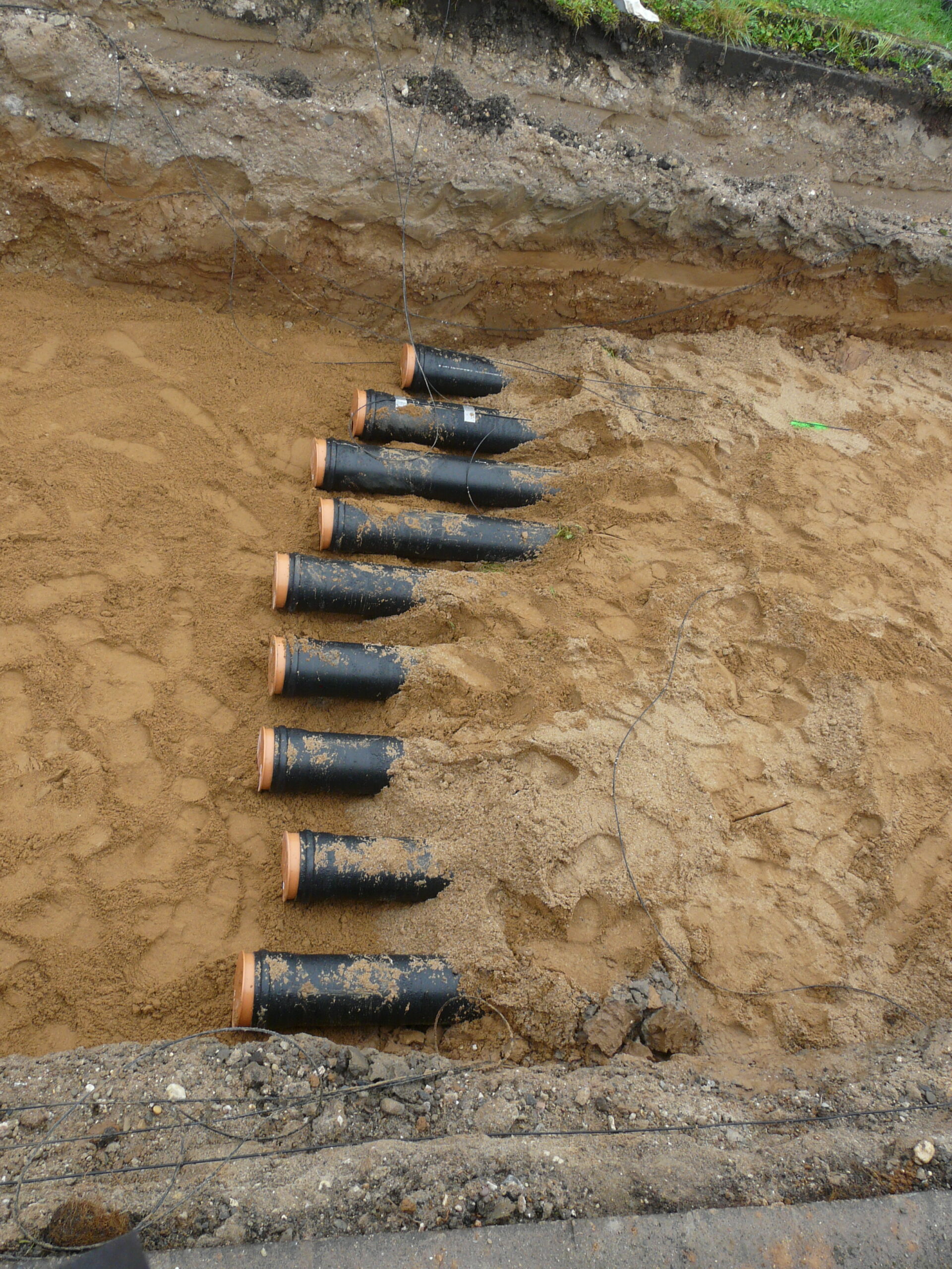 Einsanden erster Bettungsmaterialabschnitt Sand