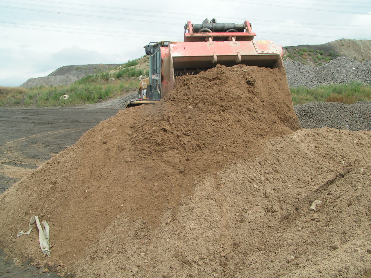 Material rieselfähig machen für Flüssigbodenherstellung